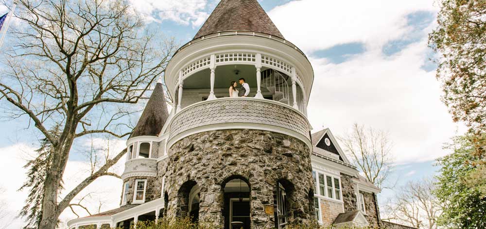 wedding couple standing together in Auburn Valley mansion