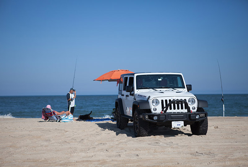 Jeep on the beach fishing.